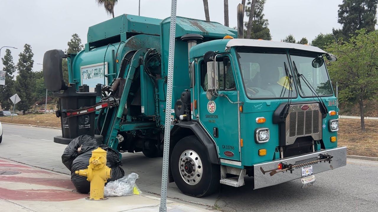 Mini Amrep Garbage Truck on Automated Litter Bins