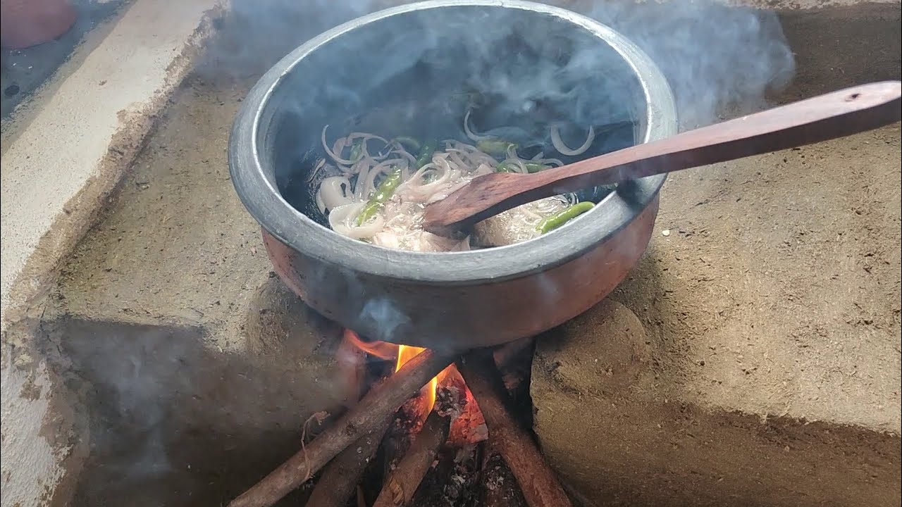 Back to basics: Channeling the essence of tradition with a rustic mud stove cooking experience. 🔥🍚