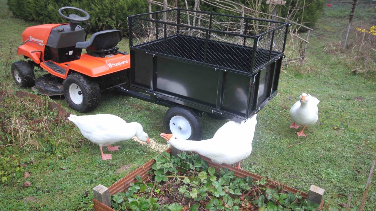 Husqvarna LT130 Lawn Tractor with trailer.