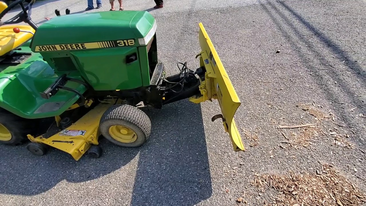 John deere 318 vs cub cadet 3225 pulling
