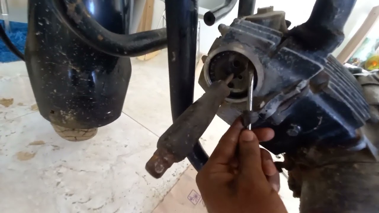 Como bajar la cabeza de un motor honda eco 100