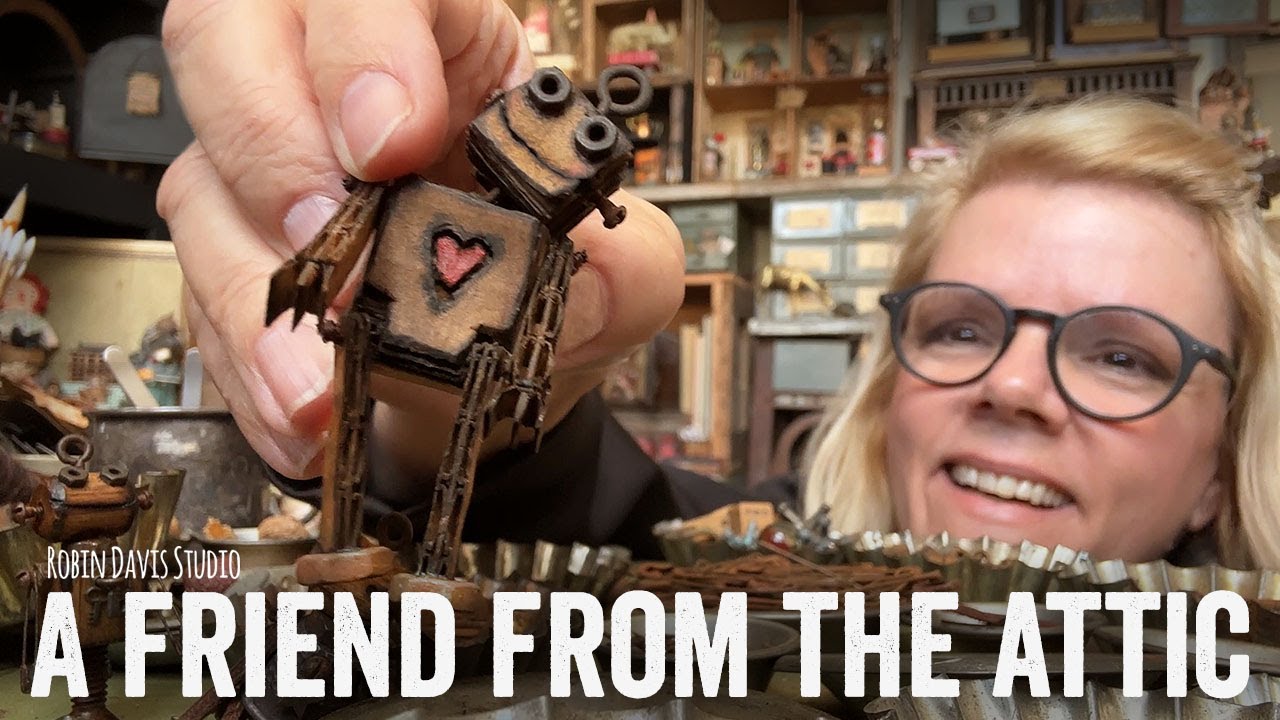 A friend from the Attic - Pocket makes a tiny cardboard robot.