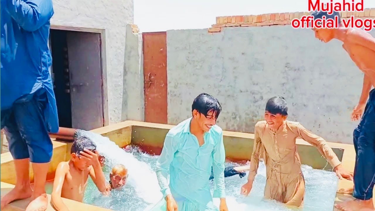 Swimming in tubewell water pool| tube well water fun by village boys| swimming pool