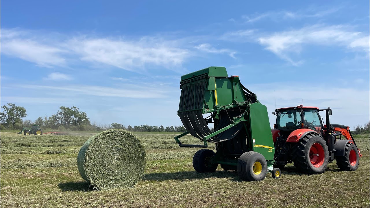 Raking & baling hay! Trying to beat the rain! 