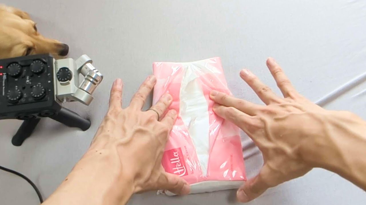 Gently massage the tissue box with your hand ASMR