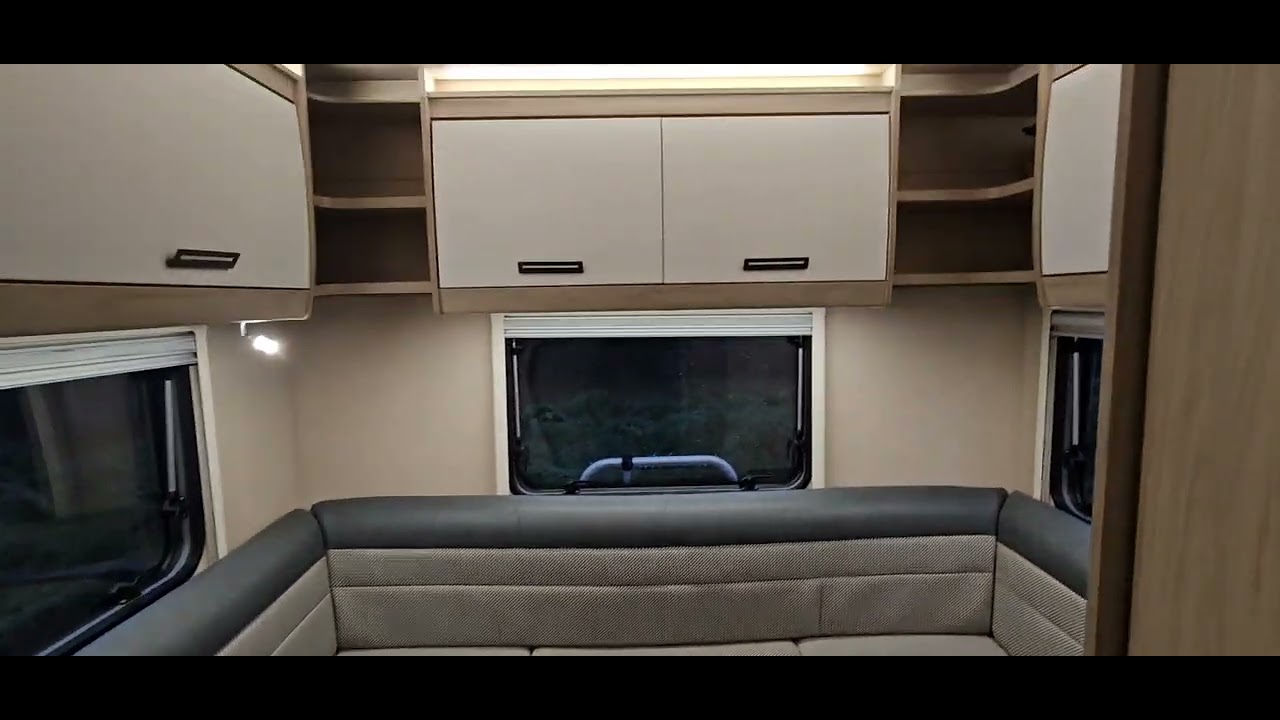 Electric Drop down bed 4 seatbelt 6 berth motorhome from Autotrail in night mode 