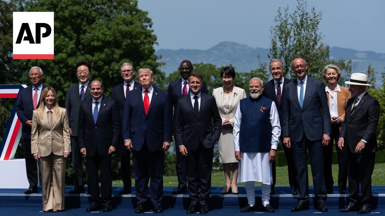Trump and G7 leaders pose for a family photo at summit in France