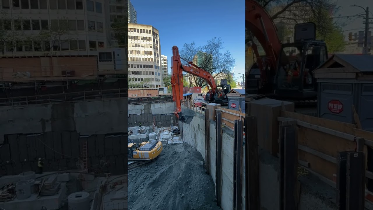 Hayco Equipment&rsquo;s extending stick excavator loading out dirt on a deep excavation project