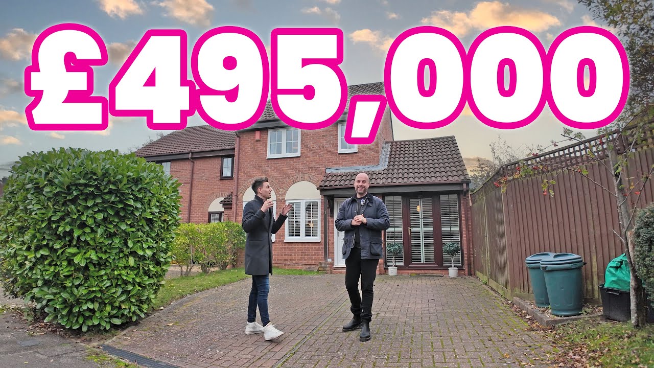 Touring a three bedroom in the Keephatch area with a converted garage and huge rear garden