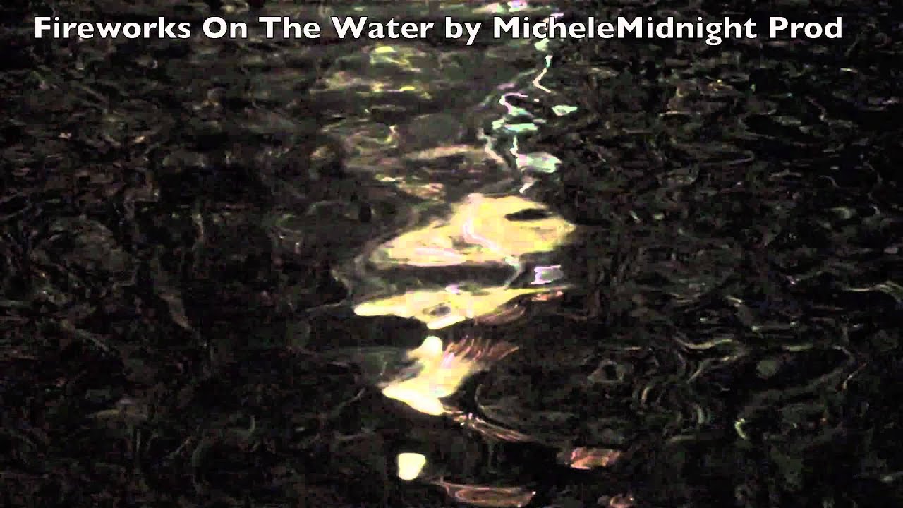 Fireworks Reflected On The Water by MicheleMidnight