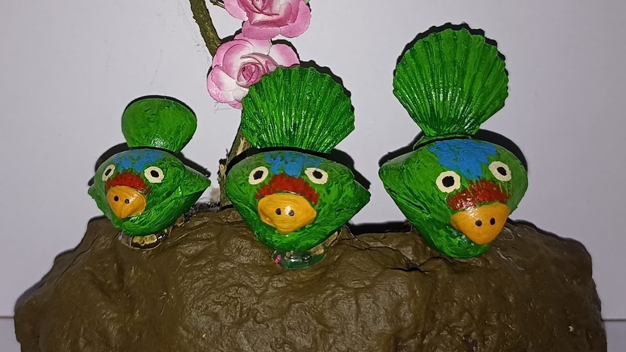 idea  con  conchas de mar/ pajaritos pintadas con pinturas acrílicas