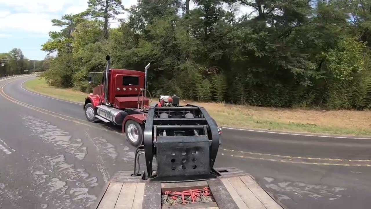 12.7 60 series detroit with 6in Straight pipes transporting bulldozer’s
