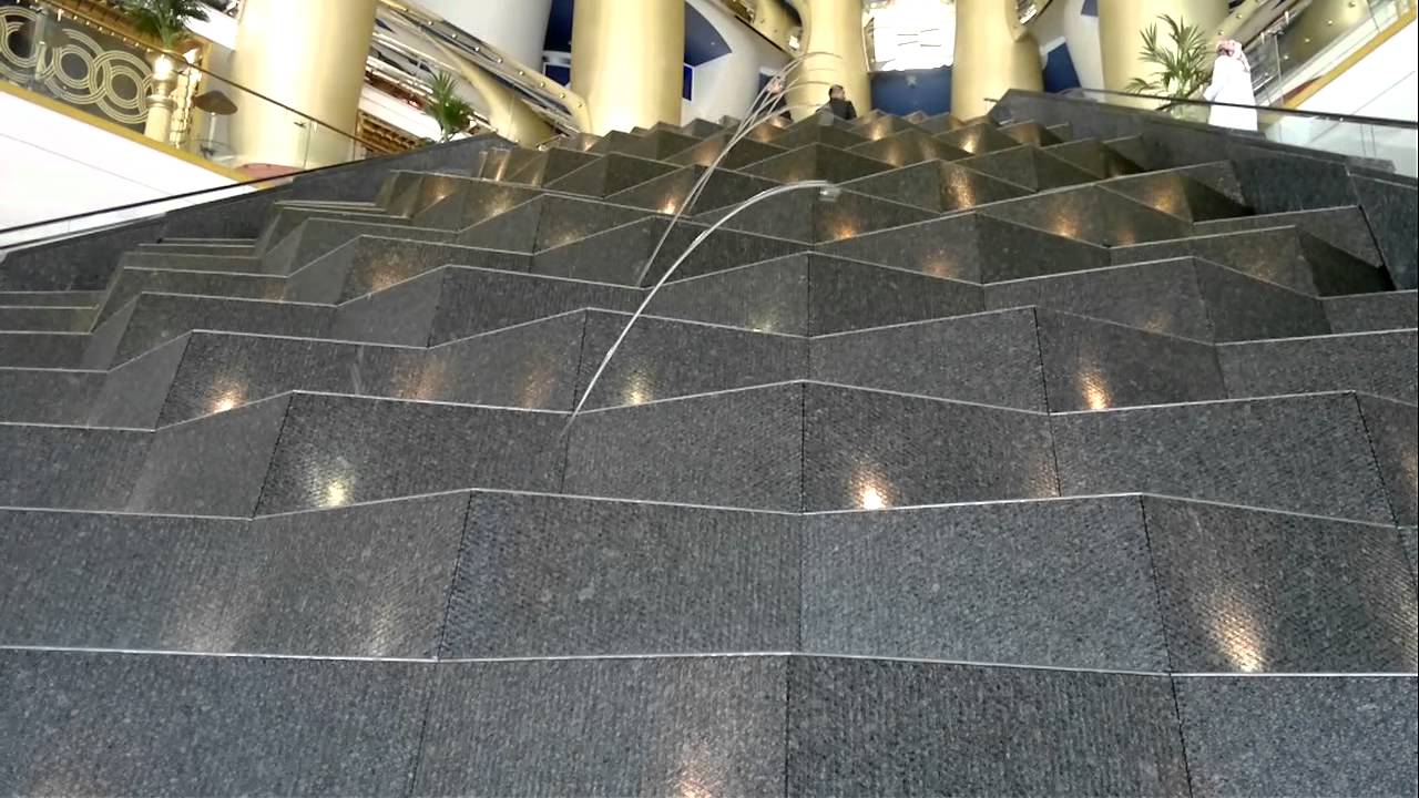 WATER FOUNTAINS AT THE BURJ AL ARAB HOTEL IN DUBAI.