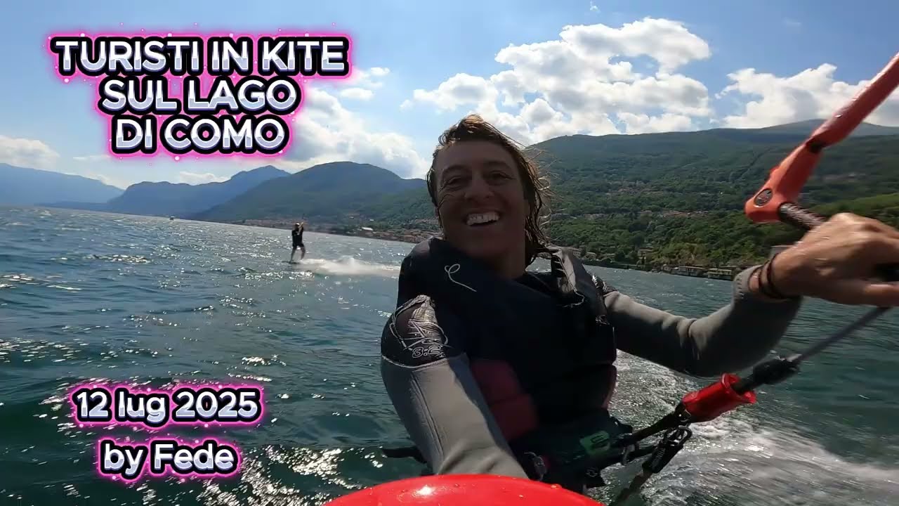 Turisti sul lago di Como in kite