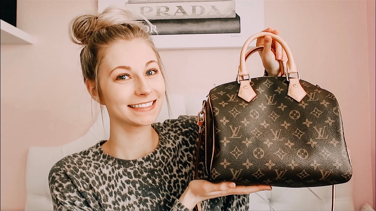 louis vuitton speedy b 25 one year update + mini whats in my bag!