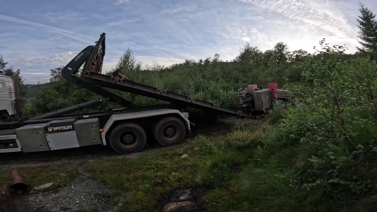 Dragging 80 000 pounds up a tractor road to drill a water well
