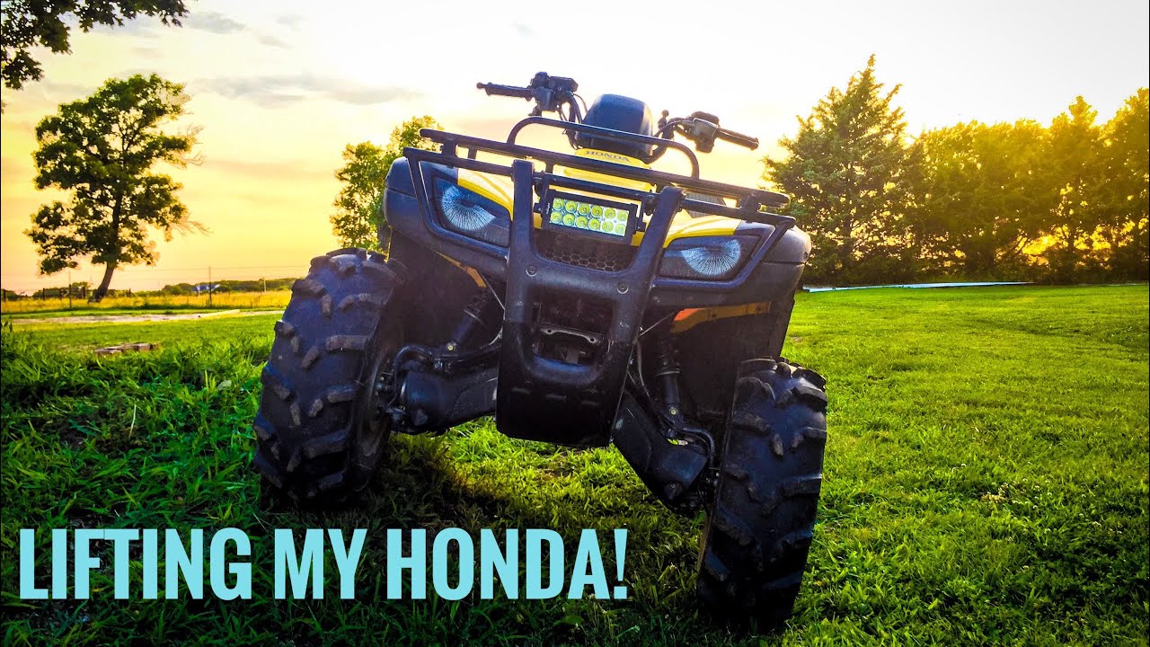 Installing 2” inch Honda ATV lift!
