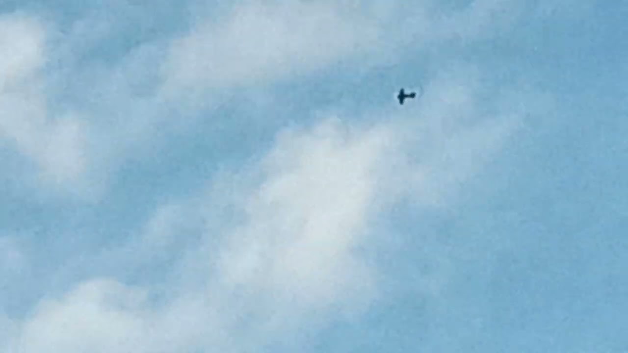 Extra-EA-300/L stunt plane flying over my house   