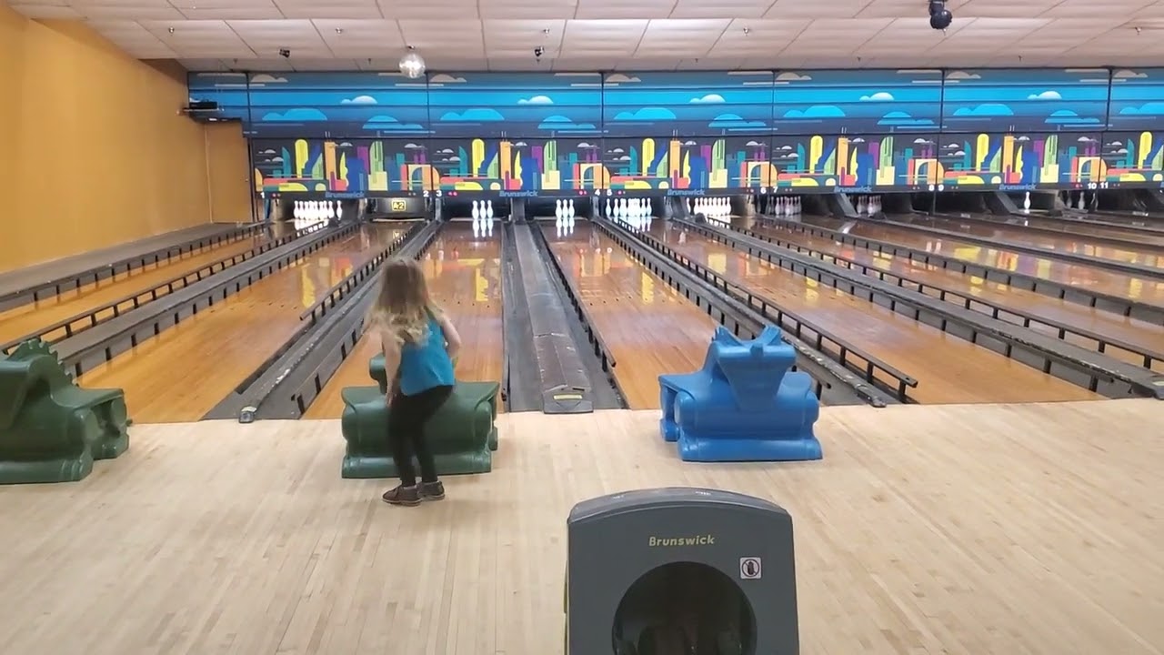 Catherine bowling with a kid ramp