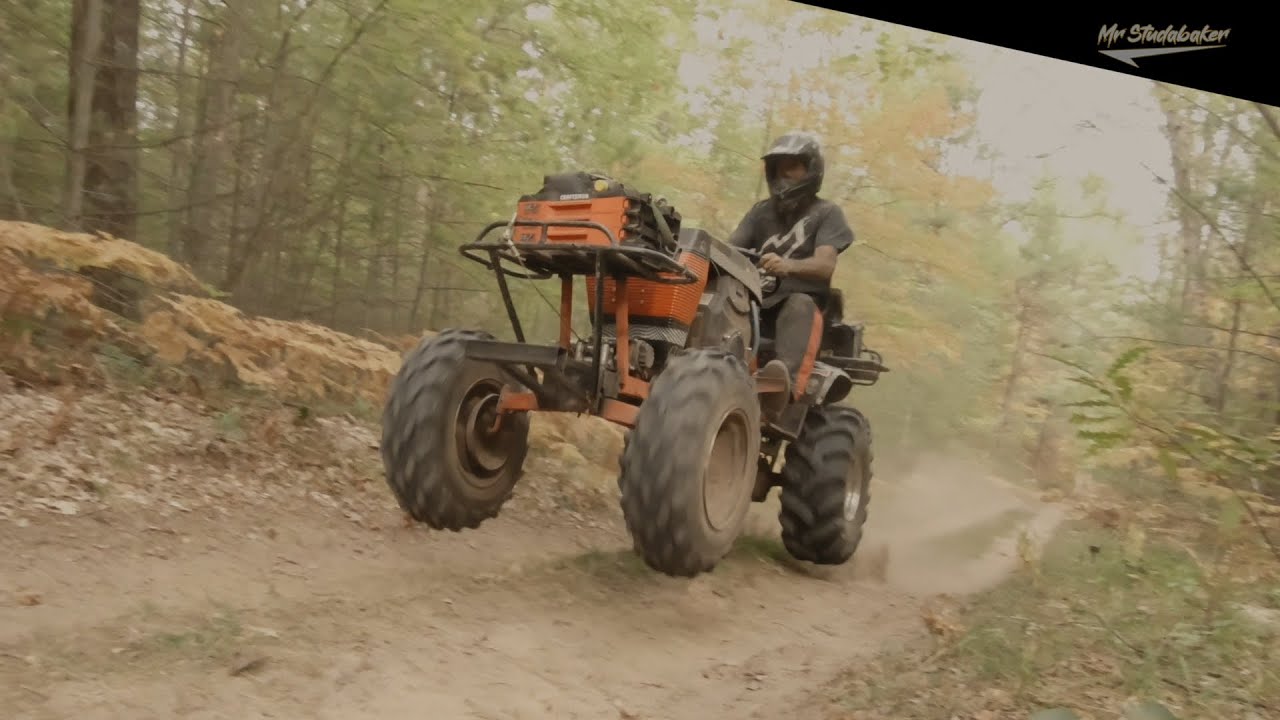 Ogemaw Hills mud mower ride with the boys