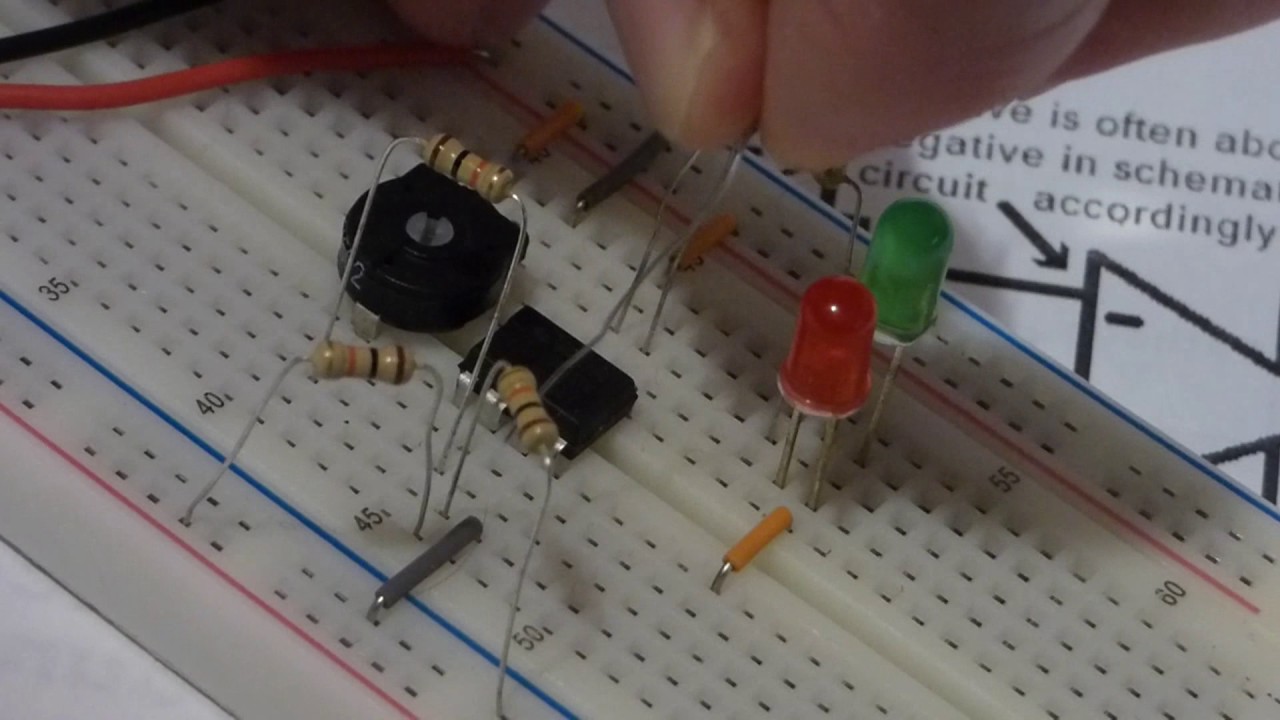 Quick intro and explanation of schmitt trigger using 741 op amp demonstration circuit and multimeter