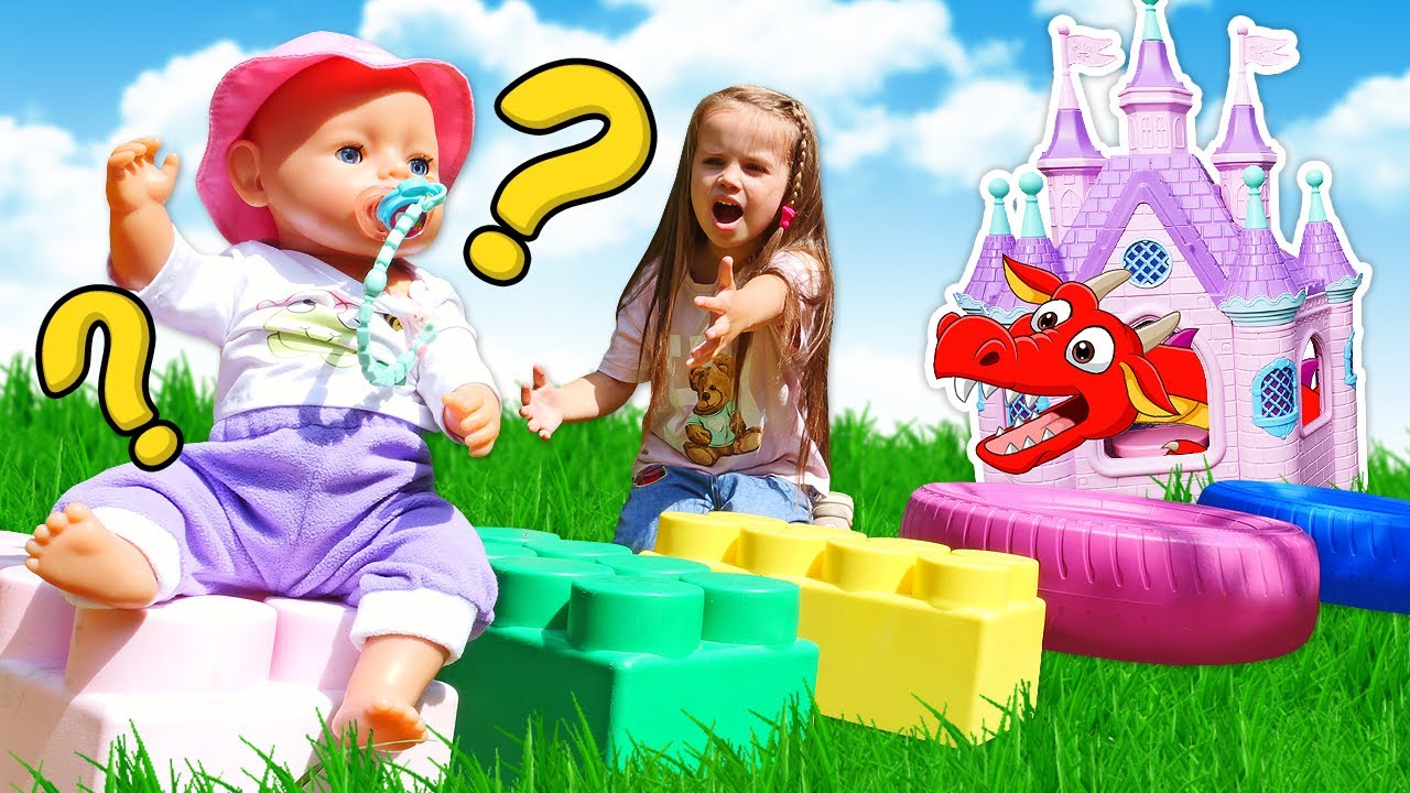 La bambola e uno drago giocattolo. Video per bambini e giochi con le bambole