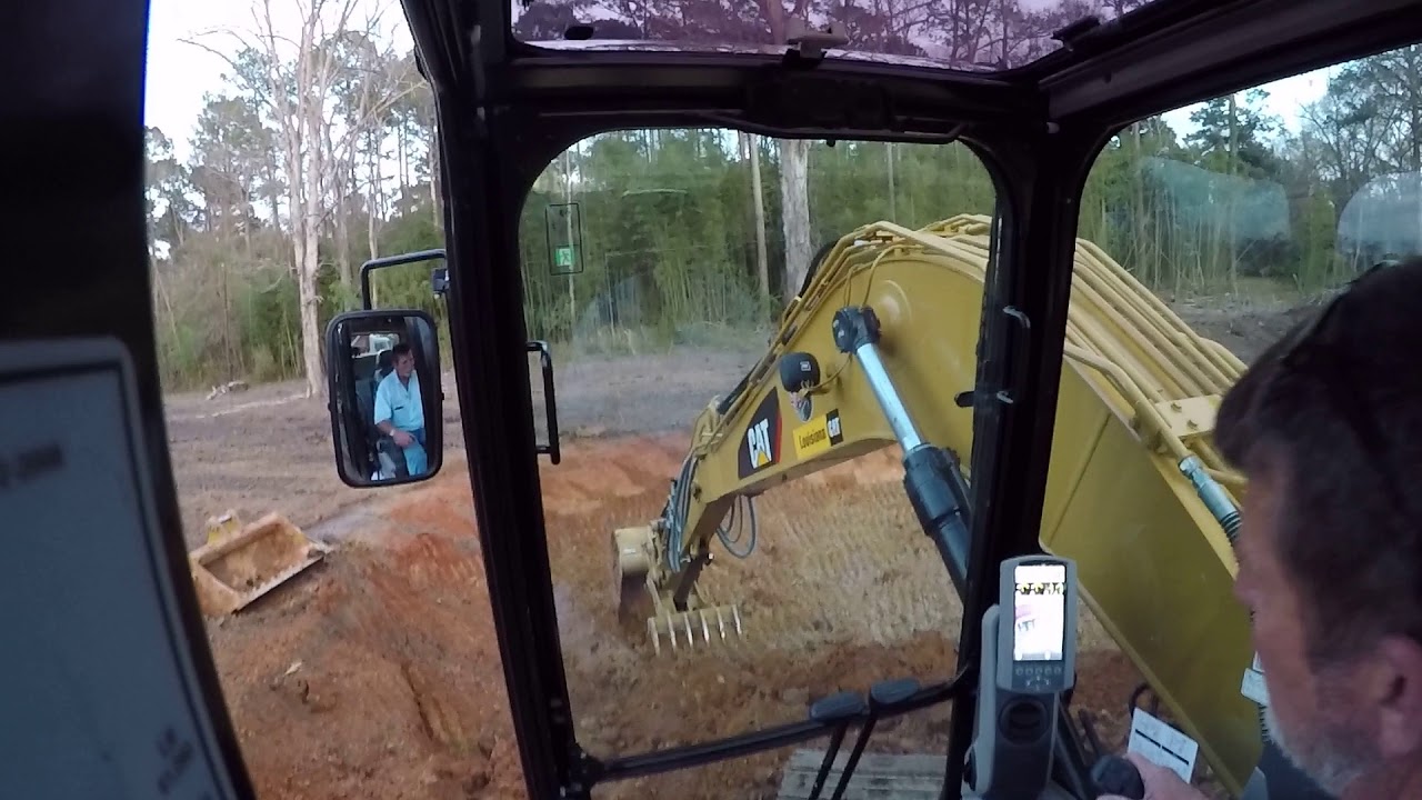 loading dump truck cat 313fl excavator