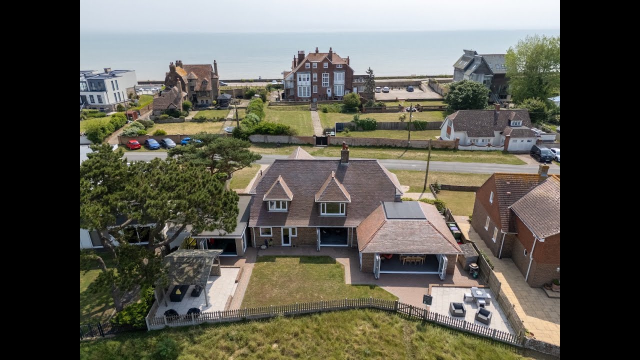 For Sale–Coastal Living in charming Littlestone, Kent, home backing onto golf course, sea views.