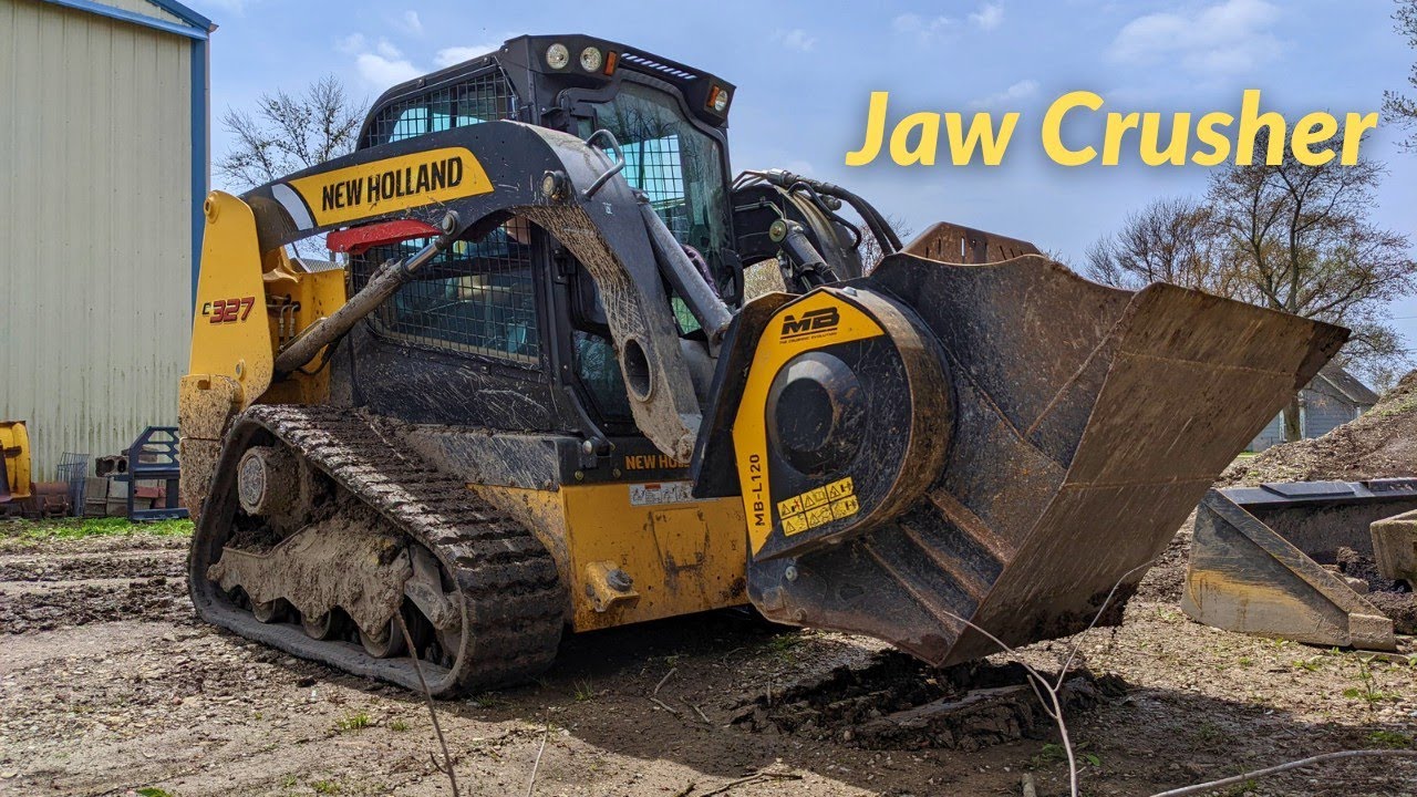 New Holland Skidsteer Crushing Concrete With Jaw Crusher
