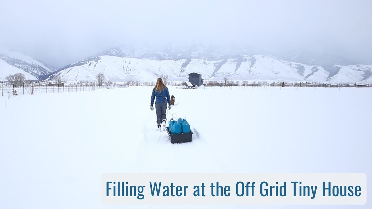 Filling the Water Tank at the Off Grid Tiny House