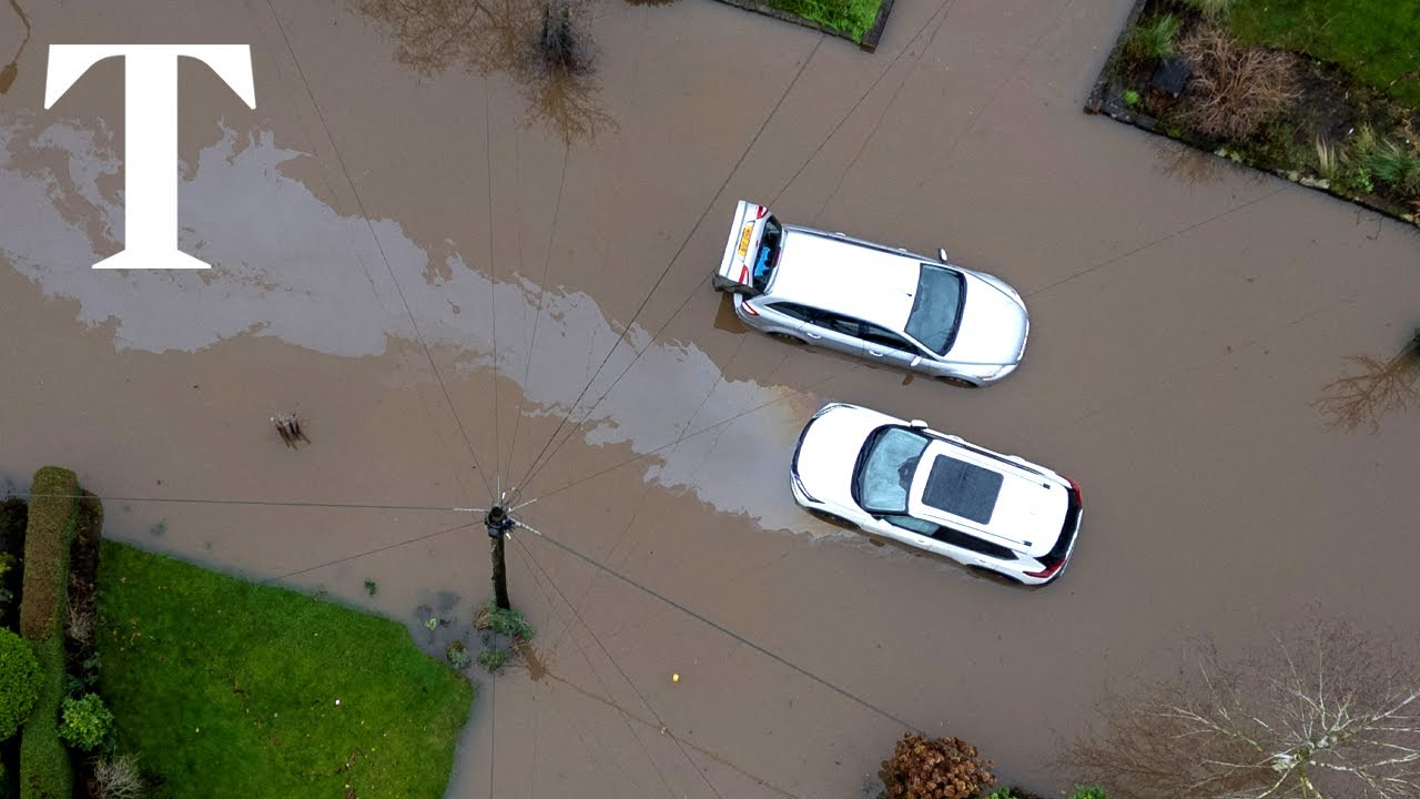 Cars abandoned as flooding strikes north-west England