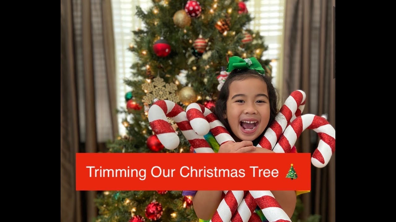 Trimming Our Mickey Mouse Themed Christmas Tree