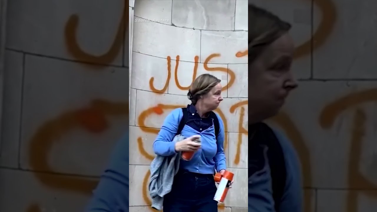 Just Stop Oil supporters paint London buildings orange