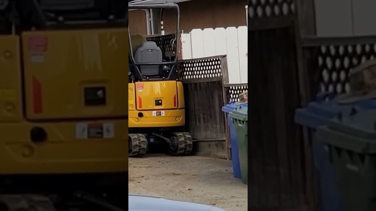 The Tight Fit Tractor Squeezes through gate.