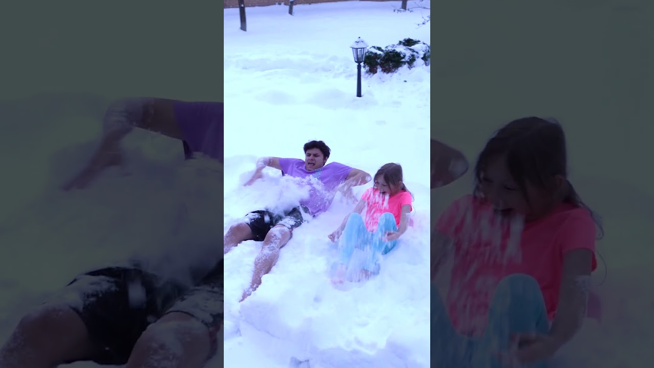 Alena and Pasha play outdoors in winter