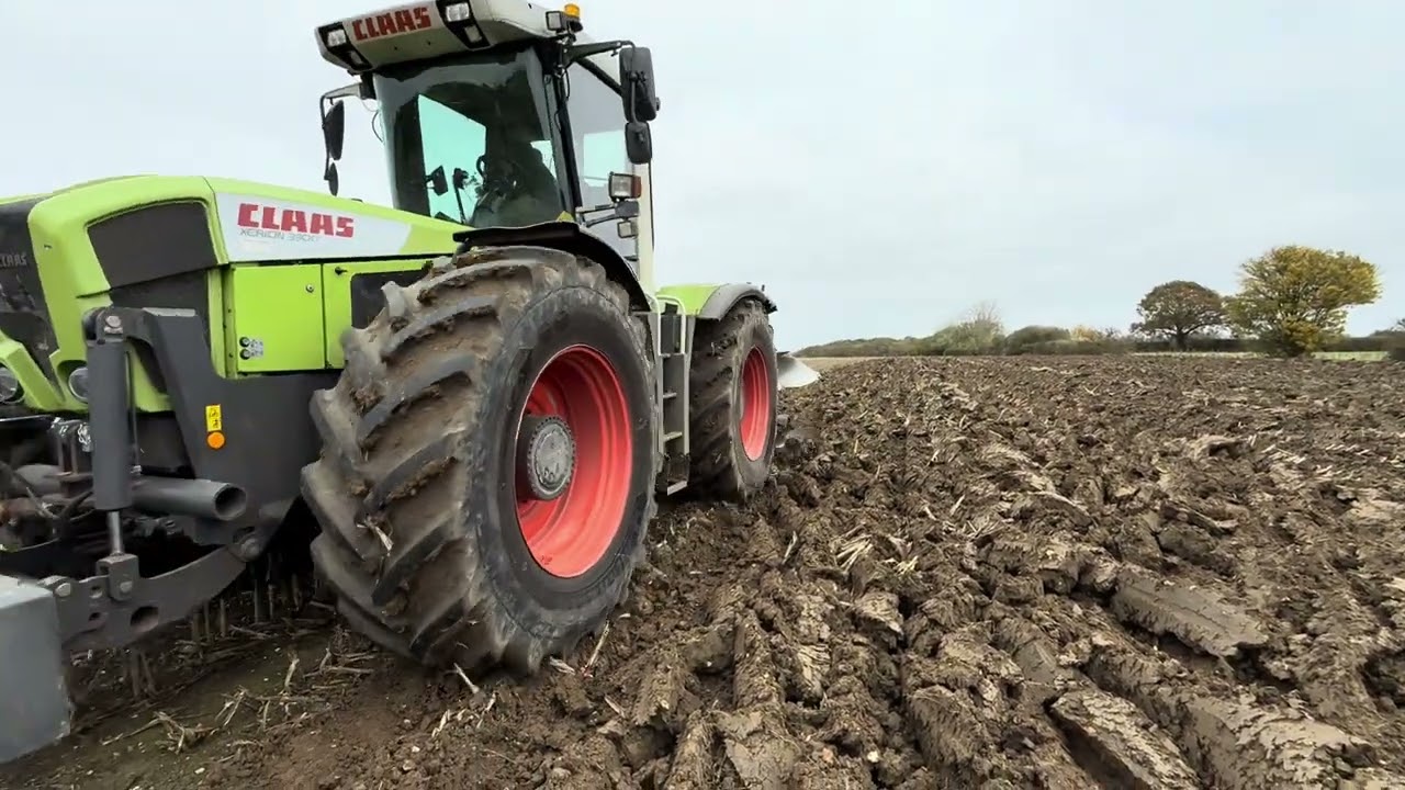 Claas Xerion 3300 ploughing.