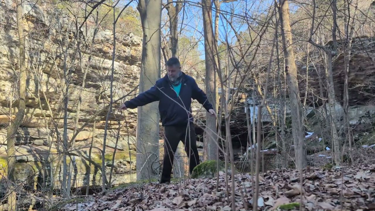 Taiji Jian On The High Rocks Near Thawing Waterfall 