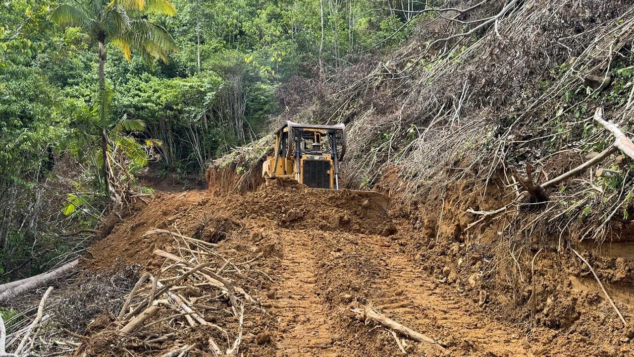 The CAT D6R XL bulldozer is a heavy-duty machine for building mountain roads