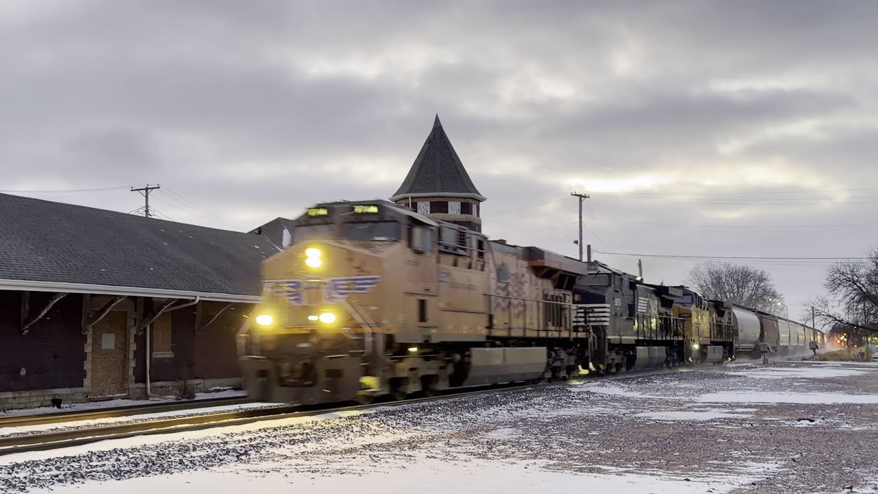 UP7744 East in DeKalb, IL with NS Dash 9