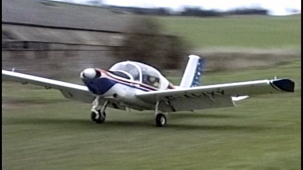 Rallye G-AWXY at Sussex farm strip, Spitfire RR232 restoration, Shoreham, Goodwood January 1991
