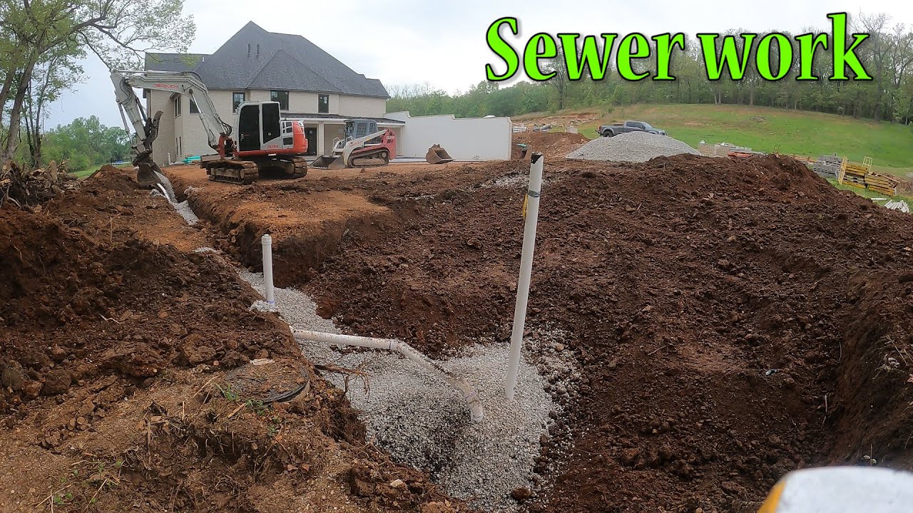 Installing The Sewer Line In This New Construction Home
