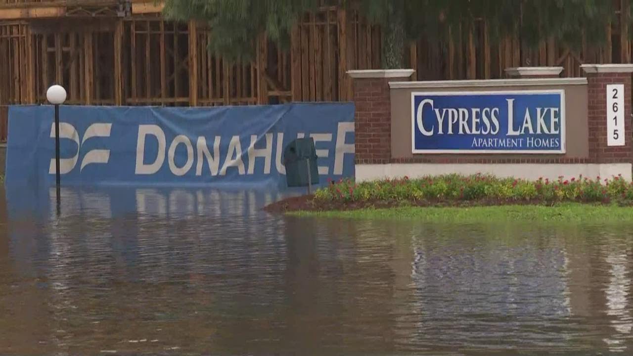 Homes flooded in several Mandeville neighborhoods as rainfall continues