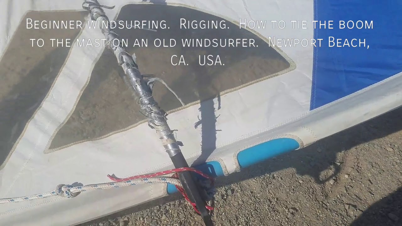 How to rig an old windsurfing board:  Tie the boom to the mast.