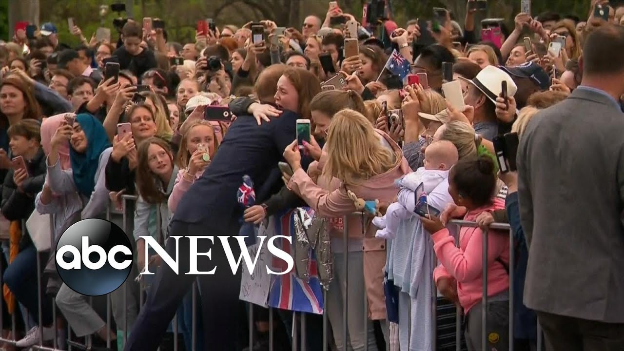 Melbourne fan breaks down in tears after receiving hug from Prince Harry