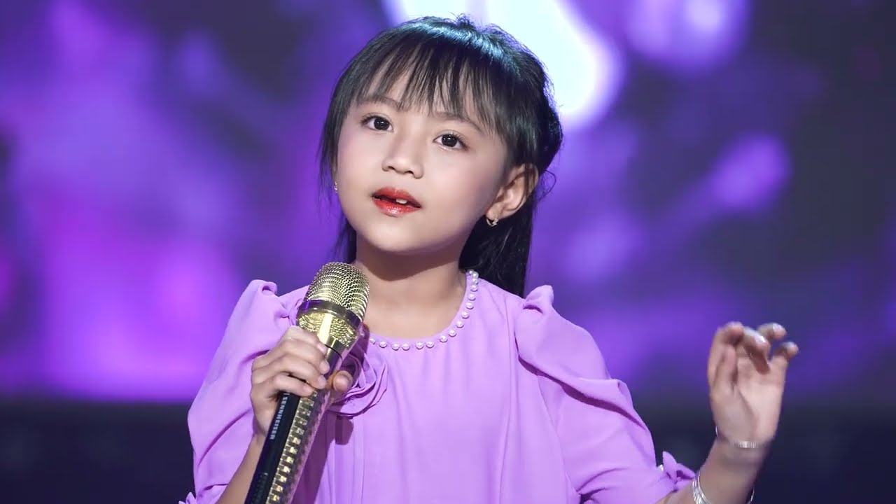 Trả Lại Em Màu Tím. Sáng tác : Mạnh Quỳnh . Trình bày : Thảo My Bé 6 tuổi đam mê hát theo thần tượng