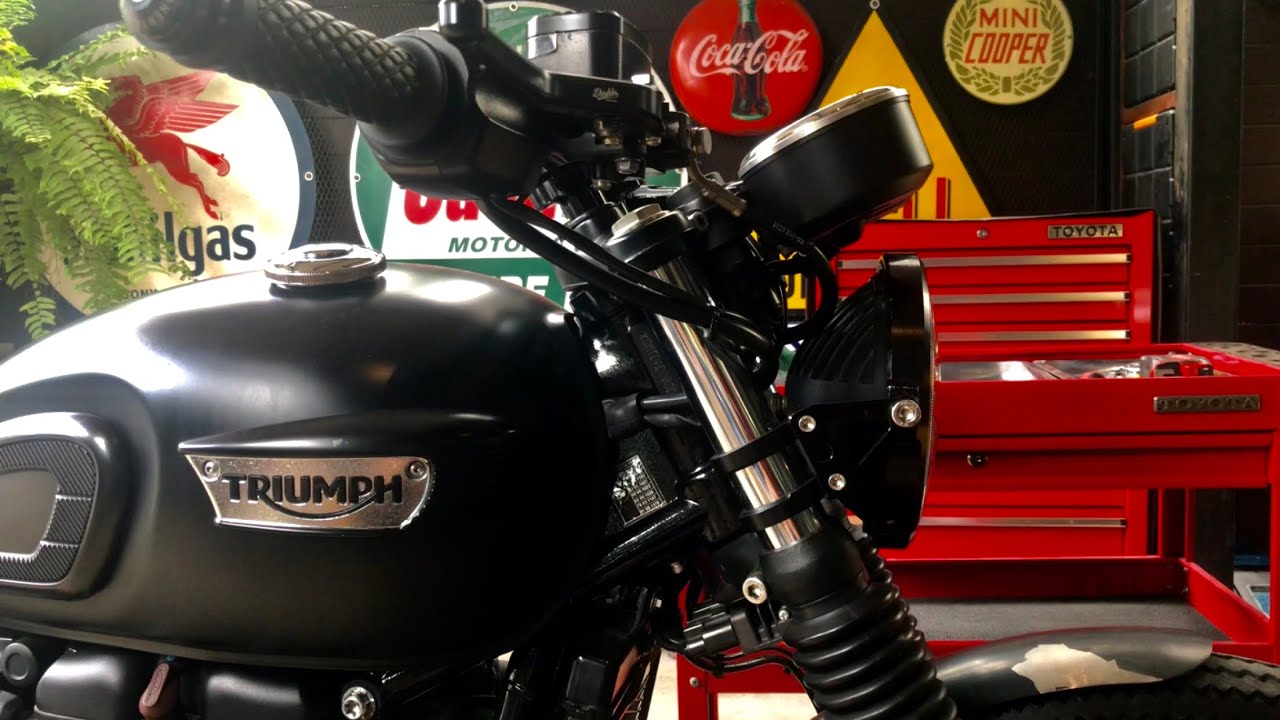 Triumph T100  Lower Gauge Bracket.