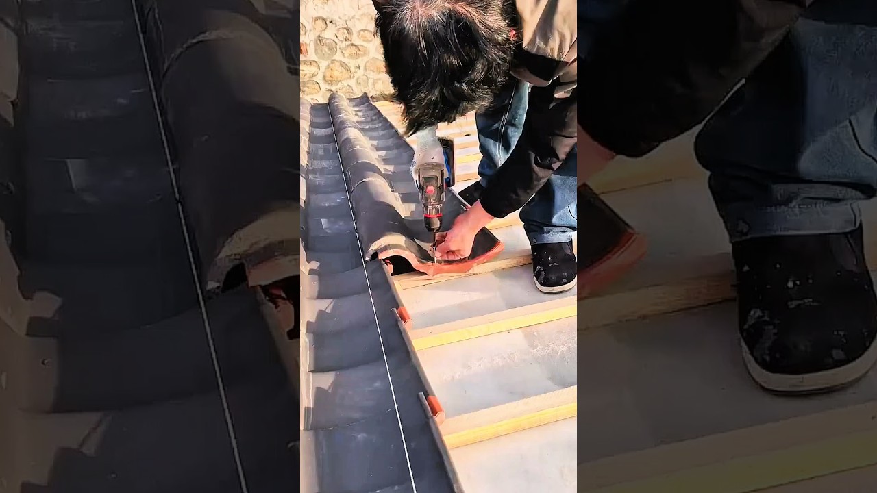 Roof tiling process shows accurate construction work technique