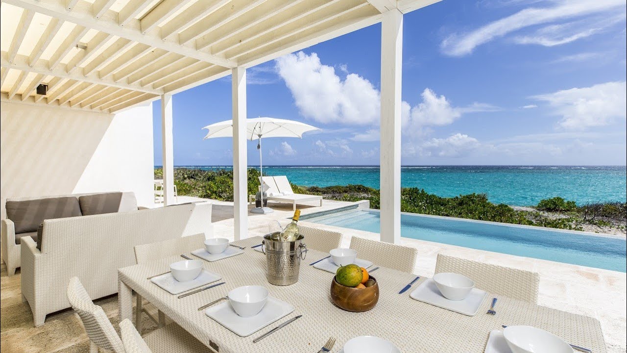 Virtual Tour: Explore the Three-Bedroom Oceanfront Reef Villa