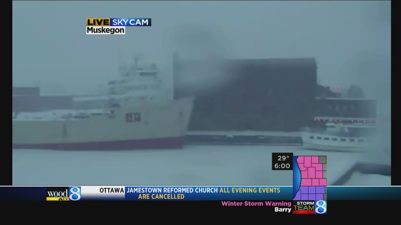 Heavy, wet snow falling in West Mich