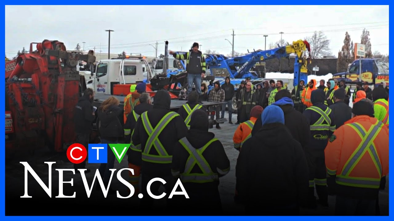 Hundreds attend tow truck procession honouring fallen operator